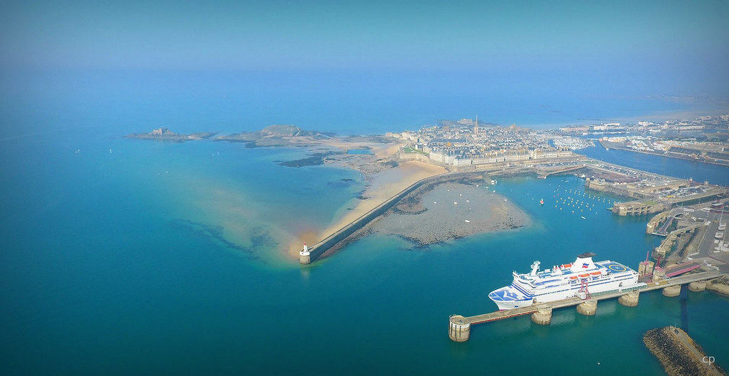 St Malo Ferry Port from the sky, looking over a docked ferry and the walled city itself