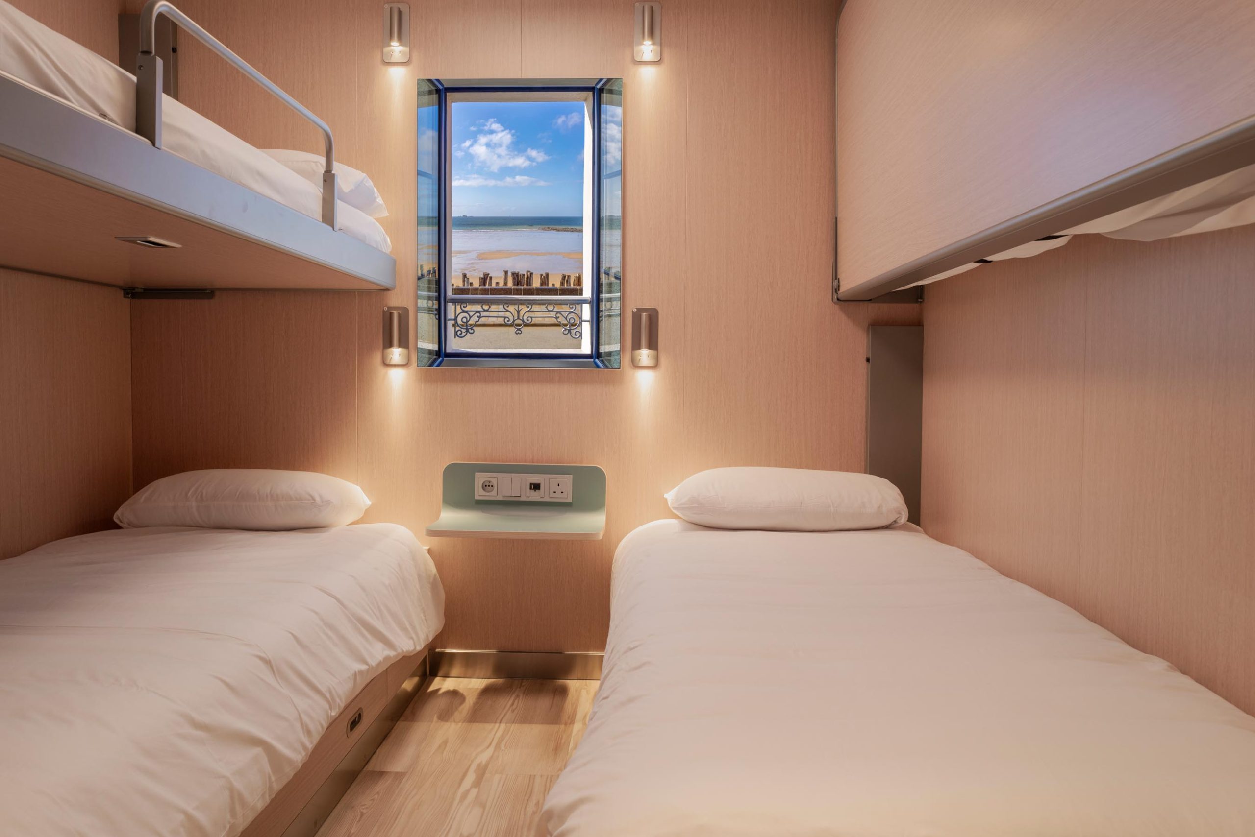 4-berth inside allergy-friendly cabin on the MV Saint-Malo with bunk-style beds and vinyl flooring